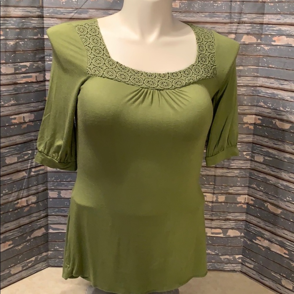 Banana Republic green tee with lace detail.